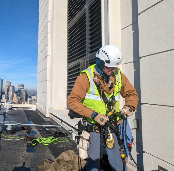 professional performing high rise work